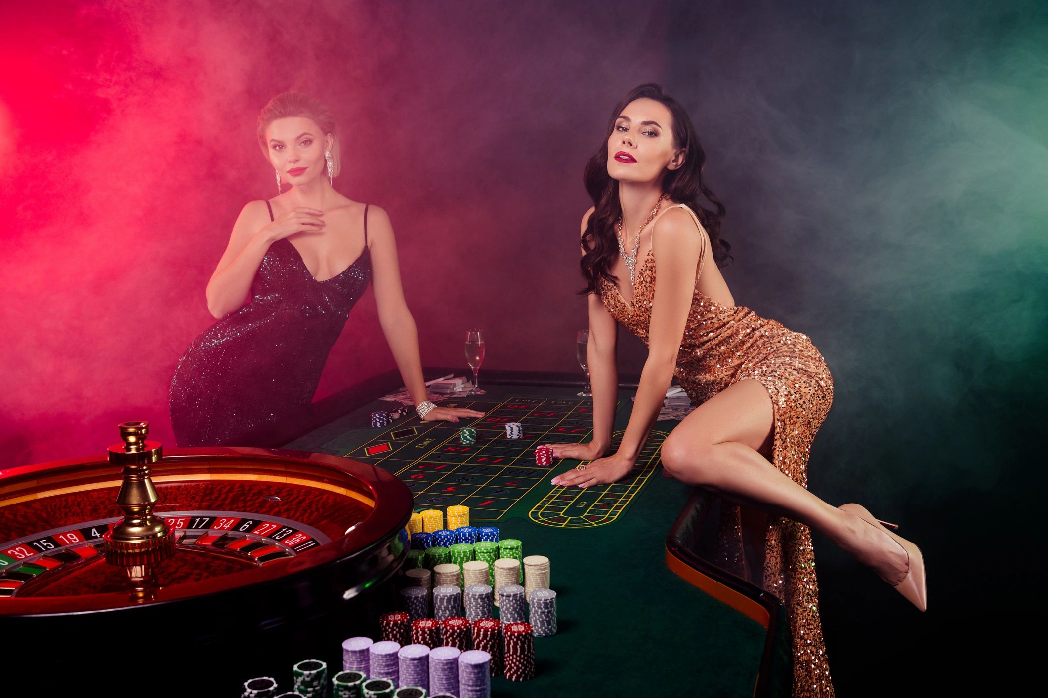 Photo of stunning hot alluring girls playing poker